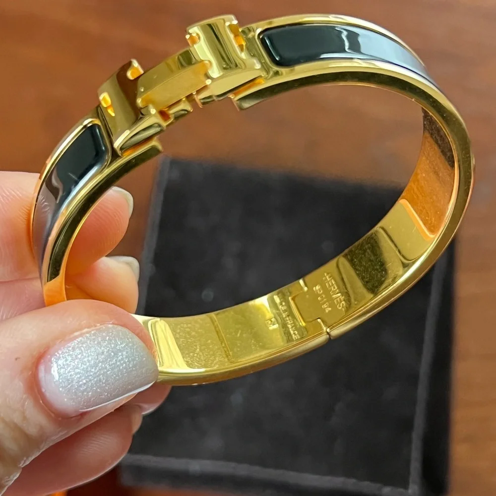 Hermès Clic H Bracelet With Gold and Black Enamel